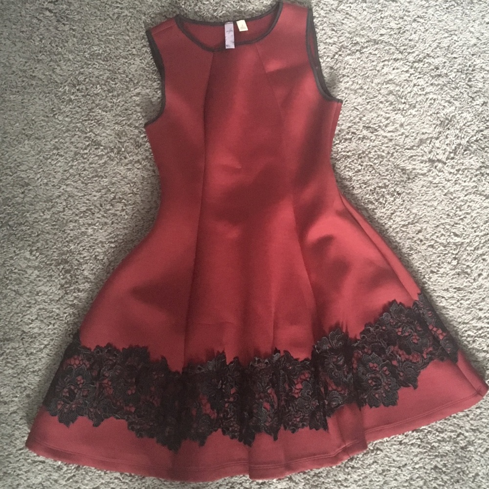 Burgandy dress with lace detail at bottom